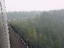 Long train; the front is off the trestle.