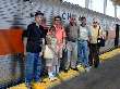 Group poses at Michiana Airport
