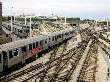 Maze of tracks at Howard Yard as Purple Line train enters Howard station