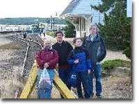 End of the line at Montauk, looking west.  Group poses at bumper post.  Trains now use high-level platform west of the station building.