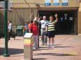 Waving “goodbye” in front of the entrance to the Mexico walkway.
