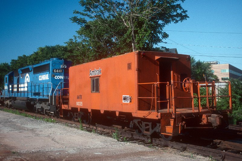 19930895-amtk.jpg - Amtrak caboose 14035 used on tie trains by Amtrak in Fort Yard, New London, CT. July 5, 1993